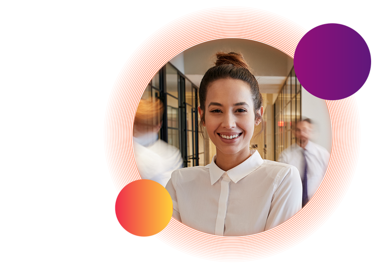 A woman wearing a white button-up shirt with her hair in a bun smiles toward the camera. This image is slightly overlapped by a small purple circle in the top-right and a small orange circle in the bottom-left.
